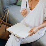 woman practicing self-discovery by journaling